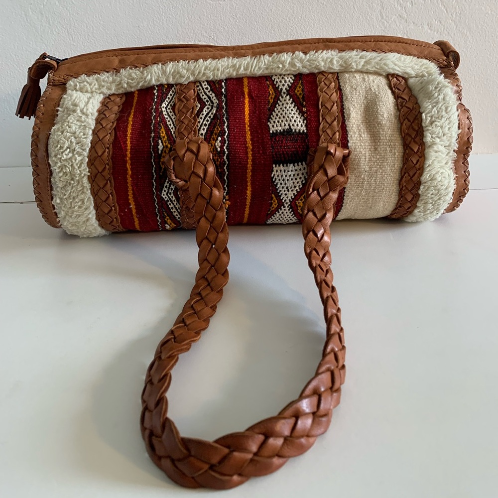 Anthropologie handbag,  Beautiful bag made with genuine leather .